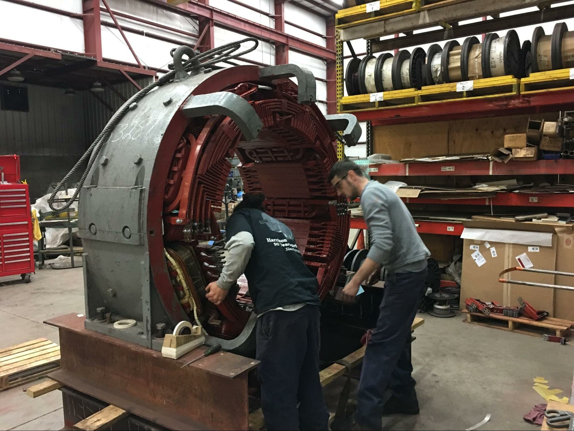 Rewinding coils on an DC Motor core that has been removed from the stator, prior to the varnish treatment